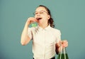 Science research in lab. Small school girl. small smart girl with testing flask. child study bilogy lesson. education