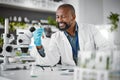 Science, sustainability and sample with a black man doctor working in a laboratory for research or innovation. Biology