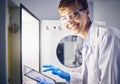 Science, tablet or lab portrait of woman with safety storage for pharmaceutical innovation, medical development or