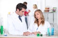 Science teacher helping student Royalty Free Stock Photo