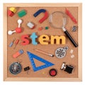 Science Technology Engineering Mathematics. STEM word on cork board with education equipment for background.