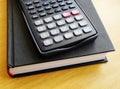 Scientific calculator on book Royalty Free Stock Photo