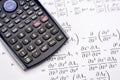 Scientific calculator and mathematical equations Royalty Free Stock Photo