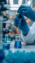 Scientific exploration Scientists hand wields test tube and flask Royalty Free Stock Photo