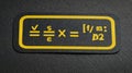 Mathematical Formula Displayed on a Black Surface Emphasizing Scientific Notation and Calculations Relevant to Physics Royalty Free Stock Photo