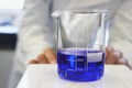 Scientific Glass Container Filled With Blue Liquid