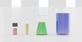 Scientific laboratory graduated cylinder and flasks full of chemical solutions for an experiment in a science research Royalty Free Stock Photo