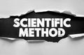 Scientific Method written on torn paper background. Educational and research concept about systematic observation, hypothesis, Royalty Free Stock Photo