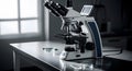 Scientific microscope in laboratory setting with slides and equipment Royalty Free Stock Photo