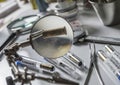 Scientific police examining a bullet cap in ballistic Laboratory