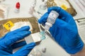 Scientific police hold positive drug reagent at crime lab