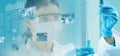 Scientific screen and chemist holding a test tube in the background Royalty Free Stock Photo