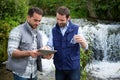 Scientist and biologist working together on water analysis Royalty Free Stock Photo