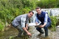 Scientist and biologist working together on water analysis Royalty Free Stock Photo