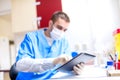 Scientist and chemist working in the laboratory with tablet