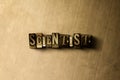 SCIENTIST - close-up of grungy vintage typeset word on metal backdrop