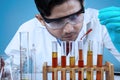 Scientist combining the chemical fluid Royalty Free Stock Photo