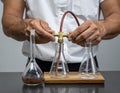 Scientist Connecting Laboratory Glassware for Experiment Royalty Free Stock Photo