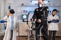 Scientist doctor in sport science laboratory wearing virtual reality goggles