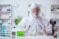 The scientist doing animal experiment in lab with rabbit Royalty Free Stock Photo