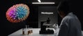 A scientist is doing laboratory research on the monkeypox virus. A microscopic view of the virus is next to her. Royalty Free Stock Photo