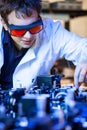 Scientist doing research in a quantum optics lab