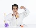 Scientist doing scientific experiment in a laboratory Royalty Free Stock Photo