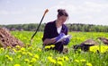 Scientist ecologist writing something on envelope.