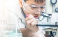 Scientist with equipment and science experiments, laboratory glassware containing chemical liquid for design or decorate science Royalty Free Stock Photo