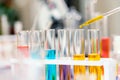 Scientist with equipment and science experiments, laboratory glassware containing chemical liquid for research or analyzing a Royalty Free Stock Photo