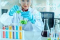 Scientist with equipment and science experiments, laboratory glassware containing chemical liquid for research or analyzing a Royalty Free Stock Photo