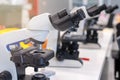 Scientist with equipment and science experiments, laboratory glassware containing chemical liquid for research or analyzing a Royalty Free Stock Photo