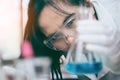 Scientist with equipment and science experiments ,laboratory glassware containing chemical liquid Royalty Free Stock Photo