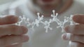 Scientist examining 3d printed molecular model Royalty Free Stock Photo