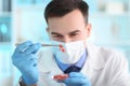 Scientist examining meat sample in laboratory Royalty Free Stock Photo