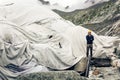 Scientist At An Expedition Site Examining A Glacier Royalty Free Stock Photo