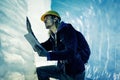 Scientist At An Expedition Site Examining A Glacier Royalty Free Stock Photo