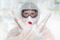 Scientist with FFP3 respirator mask is showing STOP gesture Royalty Free Stock Photo