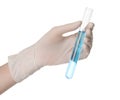 Scientist in gloves holding test tube with light blue liquid on white background, closeup Royalty Free Stock Photo