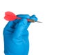 Scientist hand in blue glove holding red darts isolated on white Royalty Free Stock Photo