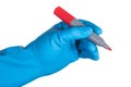 scientist hand in blue glove holding red marker for writing isolated on white background Royalty Free Stock Photo