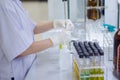 Scientist hand titration at laboratory Royalty Free Stock Photo