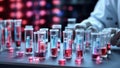 Scientist handling a micro pipette, with the lab high-tech equipment. Modern and pristine laboratory. Test tubes in Royalty Free Stock Photo