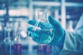 Scientist Holding Flask in Chemical Laboratory Background, Science Laboratory Research and Development Concept