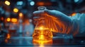 Scientist holding flask in chemical laboratory for research and development concept Royalty Free Stock Photo