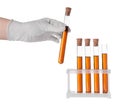 Scientist holding test tube with brown liquid on white background, closeup Royalty Free Stock Photo