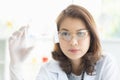 Scientist holding test tube tray in her hand Royalty Free Stock Photo