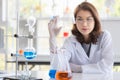 Scientist holding test tube tray in her hand Royalty Free Stock Photo