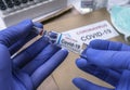 Scientist holds coronavirus vaccine in hospital