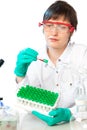 Scientist holds and examine samples in a laboratory